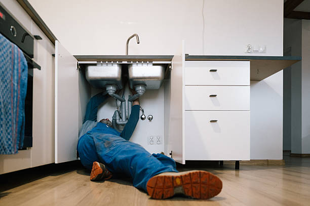 Professional Emergency Plumber technician working in Kevil, KY